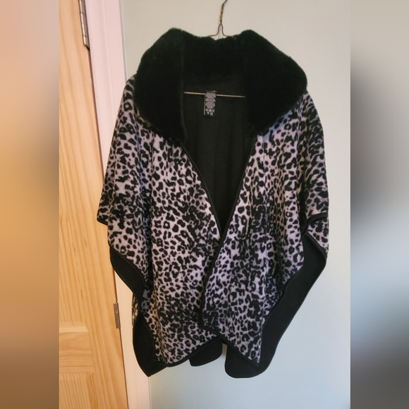 NEW CAPE - Picture 1 of 2